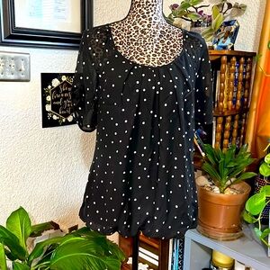 Black with silver polka dots.